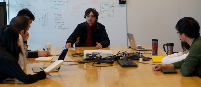 The Bravura team brainstorming design ideas.