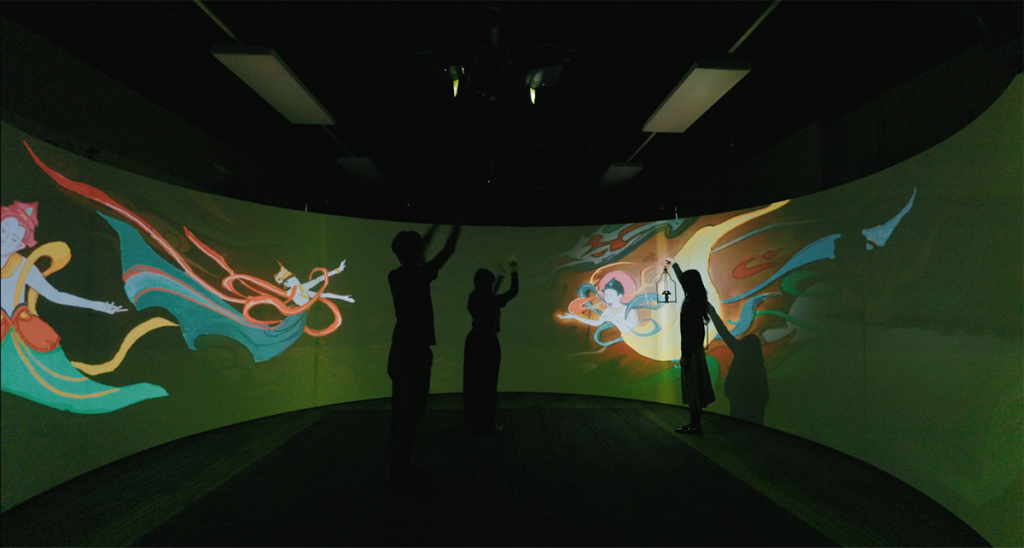 The “Flow” team testing out their project in the CAVERN (Credit: Nina Wang)
