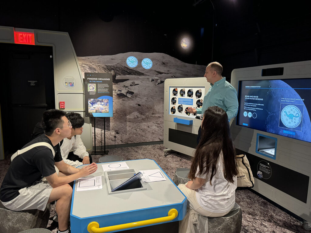 Fall 2024’s MoonRover team in discussion with Moonshot Museum’s Mike Hennessy