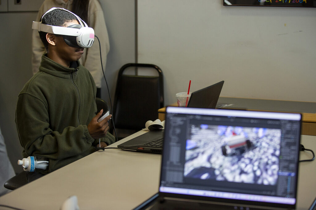 A local student tries out MoonRover’s VR experience
